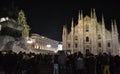 Night view to the New Year concert at the Duomo square with a lot of people present.