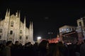 Night view to the New Year concert at the Duomo square with a lot of people present.