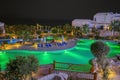 Night view to the swimming pool, building and palm trees on the beach near the red sea in Sharm El Sheikh, South Sinai, Egypt Royalty Free Stock Photo