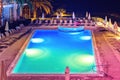 Night view from top to hotel pool with colorful lights Royalty Free Stock Photo