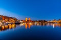 Night view of town hall in oslo viewed behind the port, Norway Royalty Free Stock Photo