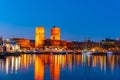 Night view of town hall in oslo viewed behind the port, Norway Royalty Free Stock Photo