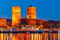 Night view of town hall in oslo viewed behind the port, Norway Royalty Free Stock Photo