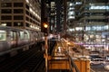 Night view of train and elevated rail line in Chicago Royalty Free Stock Photo