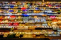 Night view of the Train Night Market Ratchada. Train Night Market Ratchada, also known as Talad Nud Rod Fai, is a new flea market