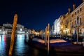 Night view of typical canal and gondolas in Venice, Italy. Royalty Free Stock Photo