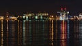 Night view of Vancouver port with container docks Centennial Terminals (Centerm) and cargo vessel of Evergreen Marine.