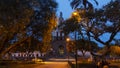 Night view of vehicles circulating in front of the Cathedral La Matriz de Cotacachi in the center of the city of Cotacachi