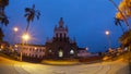 Night view of vehicles circulating in front of the Cathedral La Matriz de Cotacachi in the center of the city of Cotacachi