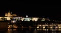Night view from, the Vltava river in Prague, Hradcany Prague castle and the Charles bridge