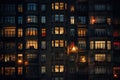 Night view of the windows of a residential building in the city, A photo of a night city, an apartment building, lots of windows Royalty Free Stock Photo