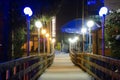 Night view of winter hanging cable-stayed bridge over the river Amanauz Royalty Free Stock Photo