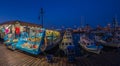 Night view with yachts and boats with souvenirs in port Mandraki marina, Rhodes, Greece Royalty Free Stock Photo