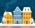 Night Vintage Town Street with Snowy Trees. Empty Winter City with Retro Houses, Cute Decorated Buildings Royalty Free Stock Photo