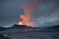 Night volcanic eruption. Fresh hot lava, flames and poisonous gases going out from the crater