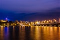 Night Voronezh skyline, bridge, modern houses, river. Copyspace