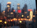 At night, water droplets on a car windshield mirror the city lights Royalty Free Stock Photo