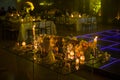 Night wedding decoration with candles and natural flowers