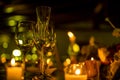 Night wedding decoration with candles and wine glasses, wedding centerpiece Royalty Free Stock Photo