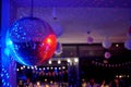 nightclub disco ball with colorful reflections