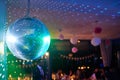 nightclub disco ball with colorful reflections