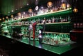 Nightclub. Illuminated bar counter in Lisbon with many bottles