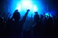 Nightclub, people and crowd with energy and lights for party, concert or rave festival with spotlight and dancing. Disco Royalty Free Stock Photo