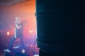Nightclub Rock Concert Concept Big Stage Audio Speaker In The Foreground And Singer Musician Blurred On Background