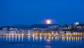 Nightfall with full moon on the beach and bay of La Concha, city of Donostia-San Sebastian, Basque Country Royalty Free Stock Photo