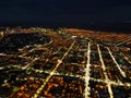 The nightlife of the city,the light of the night city from a height.Busy car traffic on city streets at night.Urban areas and the Royalty Free Stock Photo