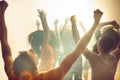 Nightlife and disco concept. Young people are dancing in club. Royalty Free Stock Photo