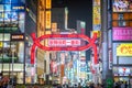 Nightlife in Kabukicho, the entrance of Kabukicho entertainment Red Light district in Shinjuku Ward, Tokyo. Billboards and Crowd