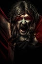 Nightmare, Young Vampire with black coat and long hair, nude Royalty Free Stock Photo