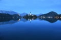 Nightscape of Lake Bled with Alps at background and blue water