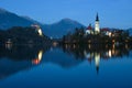 Nightscape of Lake Bled with Alps at background and blue water