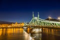 Nightshot at chain bridge on Danube river with lights Royalty Free Stock Photo