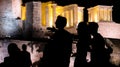 Silhouettes of tourists, visitors and locals at the Acropolis