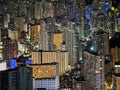 Nighttime Building Maze Illuminated, Dense Cluster Of Highrise Structures Under Starry Sky Lights Royalty Free Stock Photo
