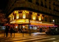 Nighttime cafe near Notre Dame Cathedral, Paris, France Royalty Free Stock Photo