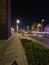 Nighttime Cityscape: A Clean and Serene View of the City with Vehicles.