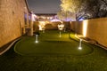 Nighttime image of a personal home putting green