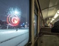 A nighttime journey through a snowy landscape viewed from a train window with abstract light Royalty Free Stock Photo