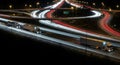 Nighttime light trails on freeway representing data-driven transportation and logistics Royalty Free Stock Photo
