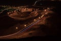 Nighttime long exposure of Viewpoint of twisted highway on Jebal Hafeet aka Jebel Hafit in Al Ain, UAE