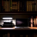 Nighttime Office Setup with Laptop and Printer on Wooden Shelf