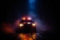 Nighttime police pursuit in thick fog, responding to a crisis