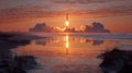 A nighttime rocket launch over water, with plume reflections and a launch pad cloud, symbolizing aerospace engineering Royalty Free Stock Photo