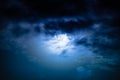 Nighttime sky with clouds and bright full moon with shiny. Royalty Free Stock Photo