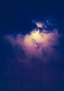 Nighttime sky with clouds and bright full moon with shiny. Royalty Free Stock Photo