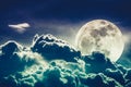 Nighttime sky with clouds and bright full moon with shiny. Cros Royalty Free Stock Photo